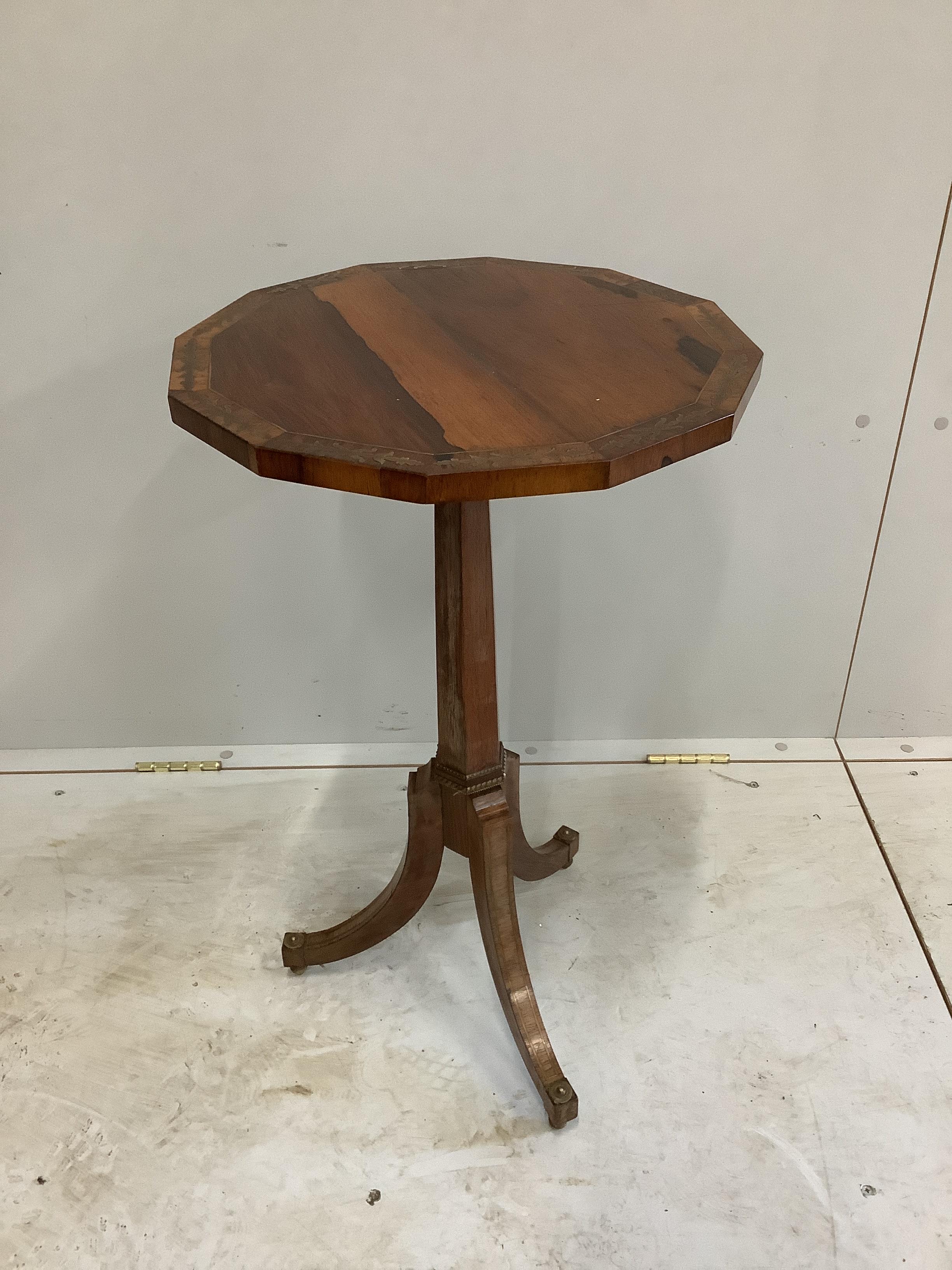 A Regency style cut brass inlaid rosewood tripod wine table, width 42cm, height 70cm